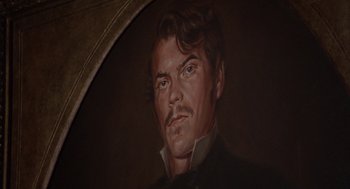 Movie still from “The Beguiled” (1971), directed by Don Siegel – A painting of a man holding an open umbrella; Extreme Close Up shot, Low angle