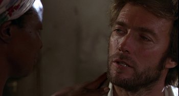 Movie still from “The Beguiled” (1971), directed by Don Siegel – A person touching a man's face; Close Up shot, Over the shoulder angle
