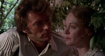 Movie still from “The Beguiled” (1971), directed by Don Siegel – A man and a woman looking at one another; Close Up shot, Low angle