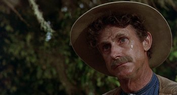 Movie still from “The Beguiled” (1971), directed by Don Siegel – An older man with a hat and a mustache; Close Up shot, Low angle