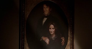 Movie still from “The Beguiled” (1971), directed by Don Siegel – A painting of a man and a woman holding hands; Extreme Close Up shot, High angle