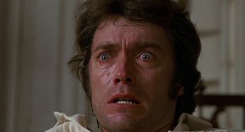 Movie still from “The Beguiled” (1971), directed by Don Siegel – A man's face as he stares into the camera; Close Up shot, Low angle