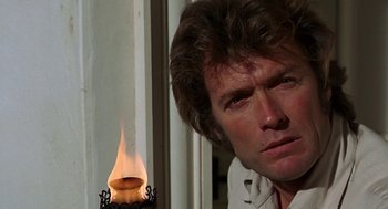 Movie still from “The Beguiled” (1971), directed by Don Siegel – A person near a candle; Close Up shot, Low angle