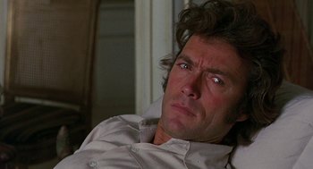 Movie still from “The Beguiled” (1971), directed by Don Siegel – A person wearing a white shirt; Close Up shot, Over the shoulder angle