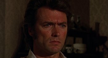 Movie still from “The Beguiled” (1971), directed by Don Siegel – A person wearing a white shirt; Close Up shot, Over the shoulder angle