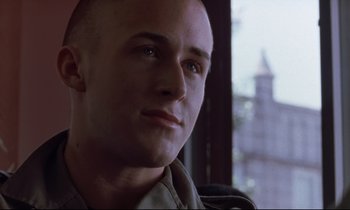 Movie still from “The Believer” (2001), directed by Henry Bean – A person wearing a military uniform; Close Up shot, Low angle