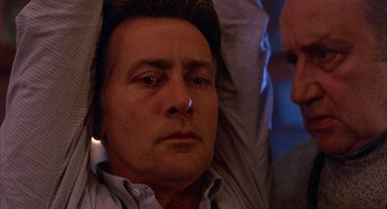 Movie still from “The Believers” (1987), directed by John Schlesinger – A person with a nose ring; Close Up shot, Low angle