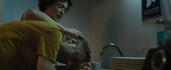 Movie still from “The Belko Experiment” (2016), directed by Greg McLean – A man and a woman in a kitchen sink; Close Up shot, Over the shoulder angle