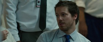 Movie still from “The Belko Experiment” (2016), directed by Greg McLean – A person wearing a shirt and a tie; Close Up shot, Over the shoulder angle