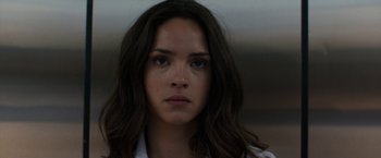 Movie still from “The Belko Experiment” (2016), directed by Greg McLean – A person with long hair; Close Up shot, Over the shoulder angle