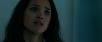 Movie still from “The Belko Experiment” (2016), directed by Greg McLean – A person looking up at the sky; Close Up shot, Low angle