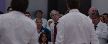 Movie still from “The Belko Experiment” (2016), directed by Greg McLean – A group of people standing in a room; Medium shot, Over the shoulder angle