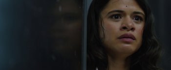 Movie still from “The Belko Experiment” (2016), directed by Greg McLean – A woman's face as she looks out a window; Close Up shot, Over the shoulder angle