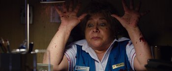 Movie still from “The Belko Experiment” (2016), directed by Greg McLean – A woman with a bunch of blood on her hands; Close Up shot, Low angle