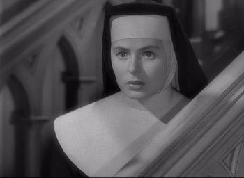 Movie still from “The Bells of St. Mary's” (1945), directed by Leo McCarey – A woman in a nun's outfit looking at the camera; Close Up shot, High angle