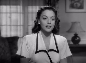 Movie still from “The Bells of St. Mary's” (1945), directed by Leo McCarey – An old black and white photo of a woman; Close Up shot, Low angle