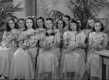 Movie still from “The Bells of St. Mary's” (1945), directed by Leo McCarey – A black and white photo of a group of young girls; Medium shot, High angle