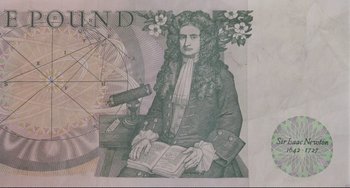 Movie still from “The Belly of an Architect” (1987), directed by Peter Greenaway – Image of a man sitting on top of a money bill; Extreme Close Up shot, High angle