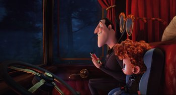 Movie still from “Hotel Transylvania 2” (2015), directed by Genndy Tartakovsky – Medium shot, Over the shoulder angle