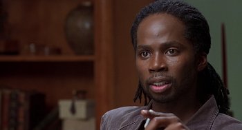 Movie still from “The Best Man” (1999), directed by Malcolm D. Lee – A person wearing a jacket; Close Up shot, Low angle