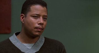 Movie still from “The Best Man” (1999), directed by Malcolm D. Lee – A person wearing a sweater; Close Up shot, Low angle