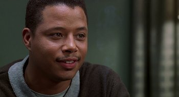Movie still from “The Best Man” (1999), directed by Malcolm D. Lee – A person wearing a sweater; Close Up shot, Over the shoulder angle
