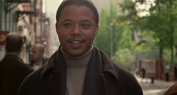 Movie still from “The Best Man” (1999), directed by Malcolm D. Lee – A person wearing a jacket; Close Up shot, Low angle