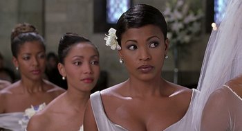 Movie still from “The Best Man” (1999), directed by Malcolm D. Lee – Two beautiful women standing next to each other; Close Up shot, Over the shoulder angle