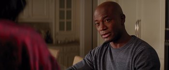 Movie still from “The Best Man Holiday” (2013), directed by Malcolm D. Lee – A man sitting at a table in front of a mirror; Close Up shot, Over the shoulder angle
