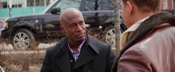 Movie still from “The Best Man Holiday” (2013), directed by Malcolm D. Lee – A man in a black jacket and a woman in a brown jacket; Close Up shot, Over the shoulder angle