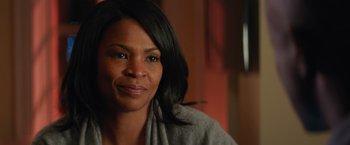 Movie still from “The Best Man Holiday” (2013), directed by Malcolm D. Lee – A person with long black hair; Close Up shot, Over the shoulder angle