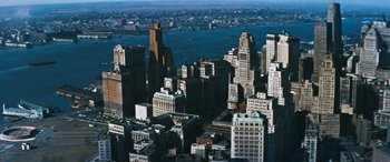 Movie still from “The Best of Everything” (1959), directed by Jean Negulesco – An aerial view of a large city with skyscrapers; Extreme Wide shot, High angle