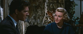 Movie still from “The Best of Everything” (1959), directed by Jean Negulesco – A man and a woman talking to each other; Close Up shot, Over the shoulder angle