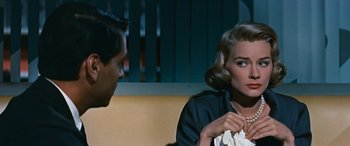 Movie still from “The Best of Everything” (1959), directed by Jean Negulesco – A man and a woman talking to each other; Close Up shot, Over the shoulder angle