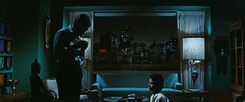 Movie still from “The Best of Everything” (1959), directed by Jean Negulesco – A man sitting at a table in front of another man; Wide shot, Over the shoulder angle