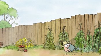 Movie still from “The Big Bad Fox and Other Tales” (2017), directed by Patrick Imbert – A man that is sitting in the grass by a fence; Wide shot, Low angle