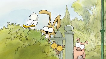 Movie still from “The Big Bad Fox and Other Tales” (2017), directed by Patrick Imbert – A group of cartoon characters in a field; Close Up shot, Over the shoulder angle