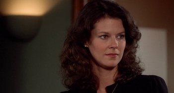 Movie still from “The Big Chill” (1983), directed by Lawrence Kasdan – A person with long hair; Close Up shot, Low angle