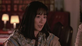 Movie still from “The Big Picture” (1989), directed by Christopher Guest – A person wearing a scarf; Close Up shot, Low angle