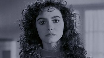 A black and white photo of a woman's face
