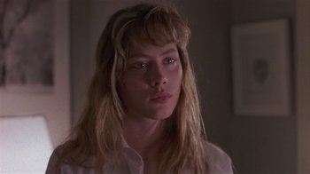 Movie still from “The Big Picture” (1989), directed by Christopher Guest – A person with long hair; Close Up shot, Over the shoulder angle