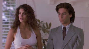 Movie still from “The Big Picture” (1989), directed by Christopher Guest – A man and a woman standing next to each other in a room; Close Up shot, Low angle