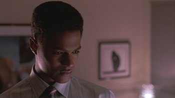 Movie still from “The Big Picture” (1989), directed by Christopher Guest – A man in a white dress shirt and a tie; Close Up shot, Low angle