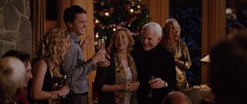 Movie still from “The Big Year” (2011), directed by David Frankel – A group of people standing next to a christmas tree; Medium shot, High angle