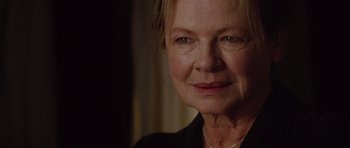 Movie still from “The Big Year” (2011), directed by David Frankel – An older woman is looking at the camera; Close Up shot, Over the shoulder angle