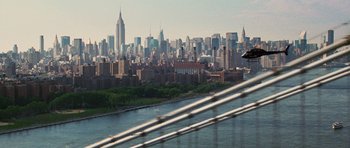 Movie still from “The Big Year” (2011), directed by David Frankel – A view of a large city from a bridge; Extreme Wide shot, High angle