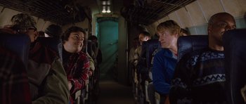 Movie still from “The Big Year” (2011), directed by David Frankel – A group of people sitting in a room together; Medium shot, Over the shoulder angle