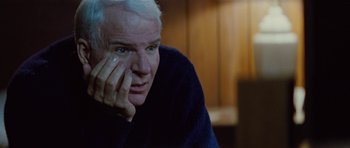 Movie still from “The Big Year” (2011), directed by David Frankel – An older man with white hair is looking at the camera; Close Up shot, Over the shoulder angle
