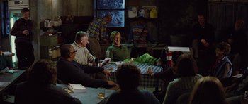 Movie still from “The Big Year” (2011), directed by David Frankel – A group of people sitting around a table; Wide shot, Over the shoulder angle