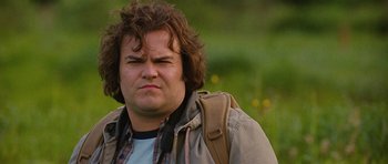 Movie still from “The Big Year” (2011), directed by David Frankel – A person wearing a jacket; Close Up shot, Low angle